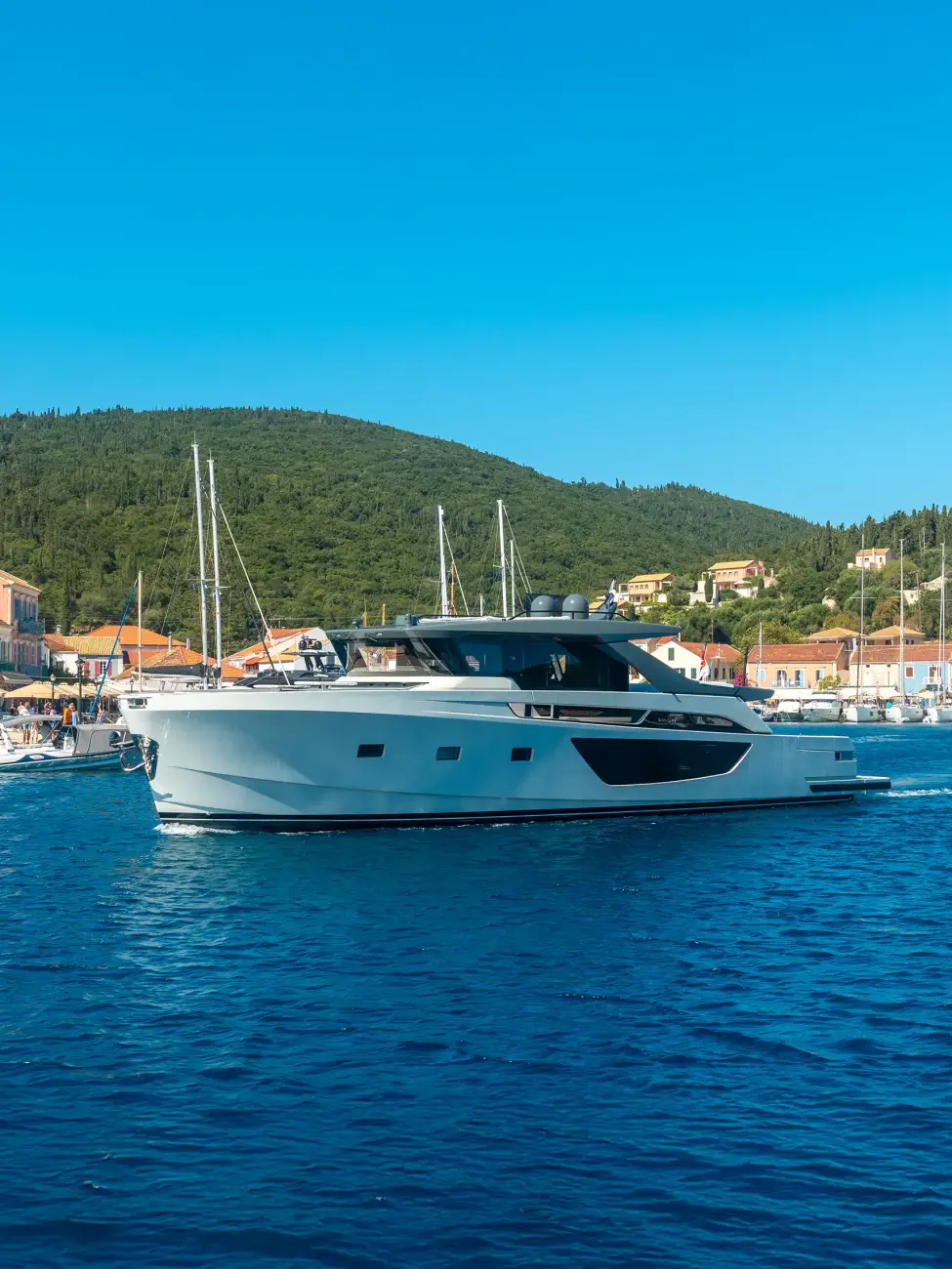 white-cruise-yacht-water-nearr-mountains-montenegro